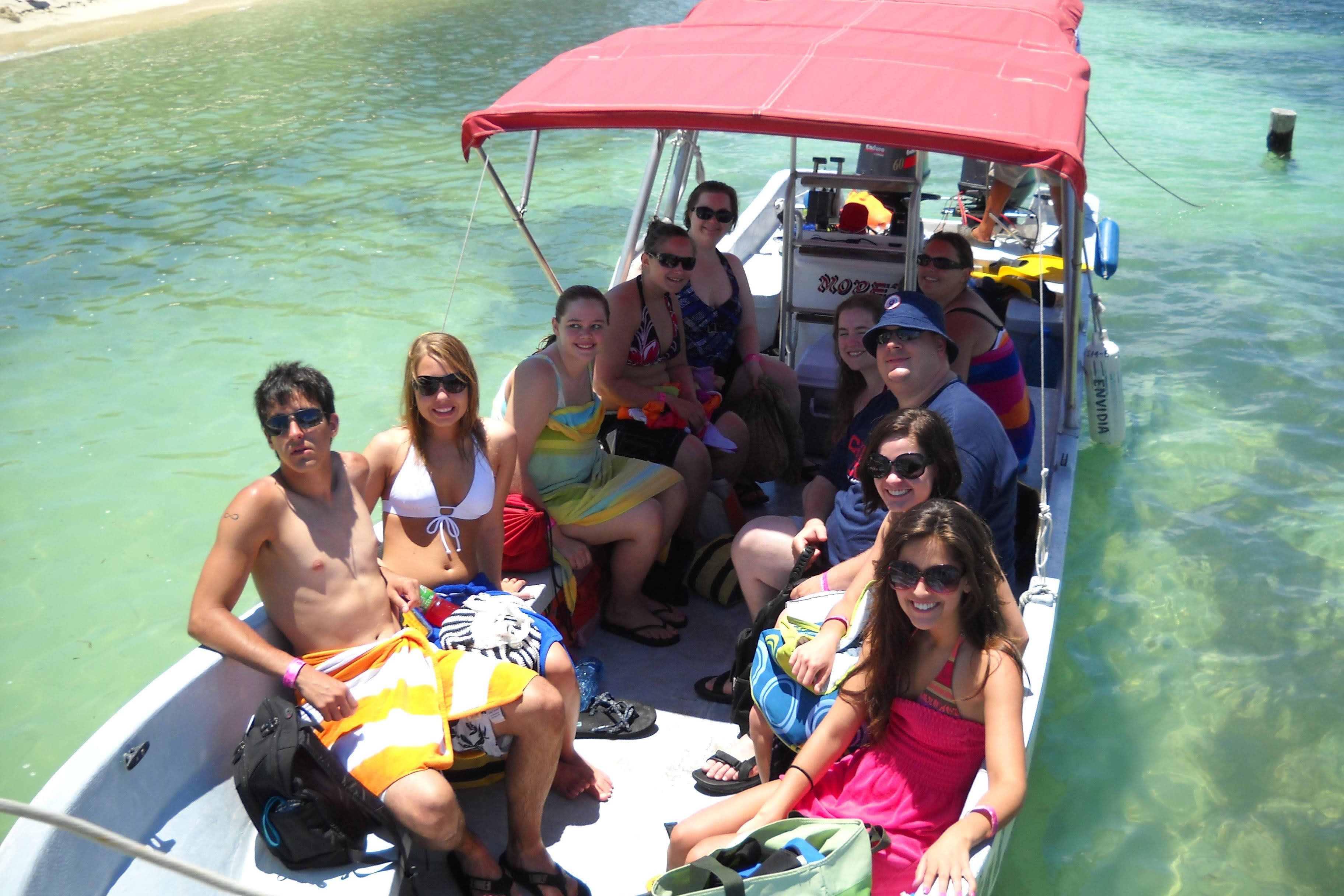 Students on a boat en route to snorkeling