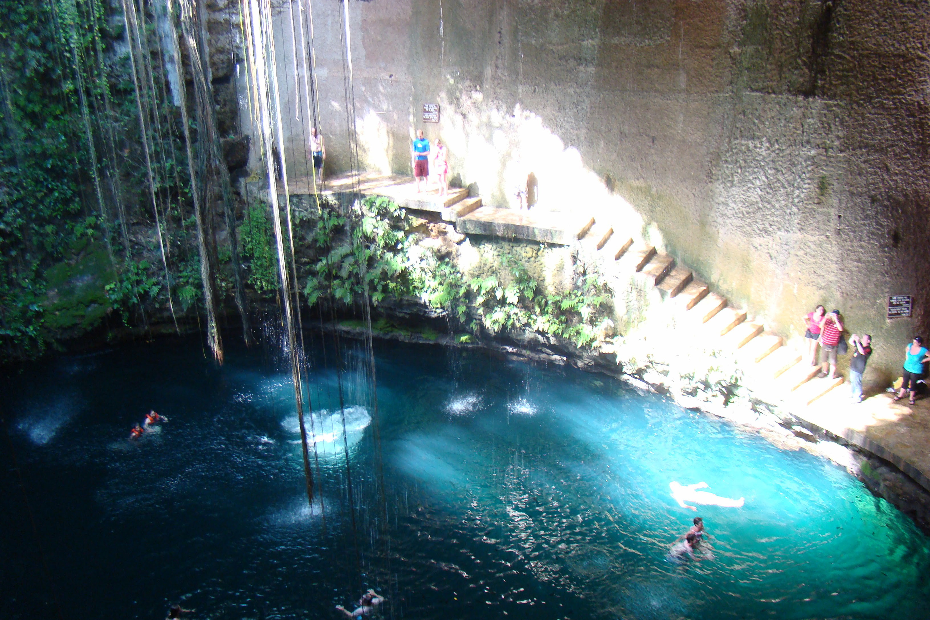 Students swimming in a cenote near Chichen Itza
