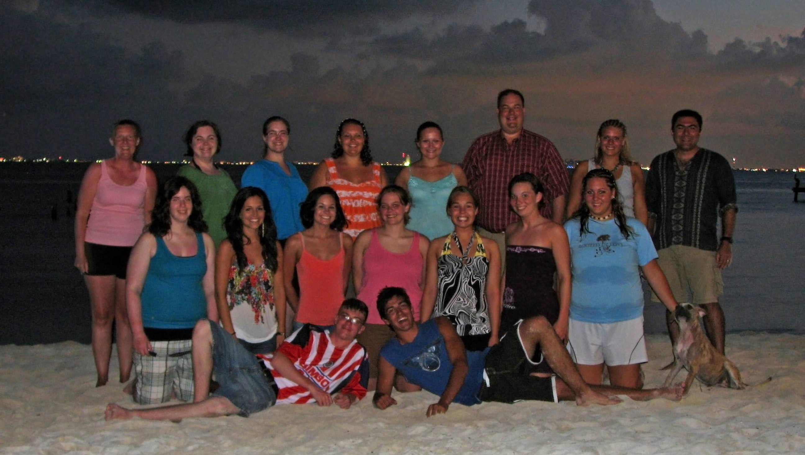 Students on the beach at sunset in Isla Mujeres