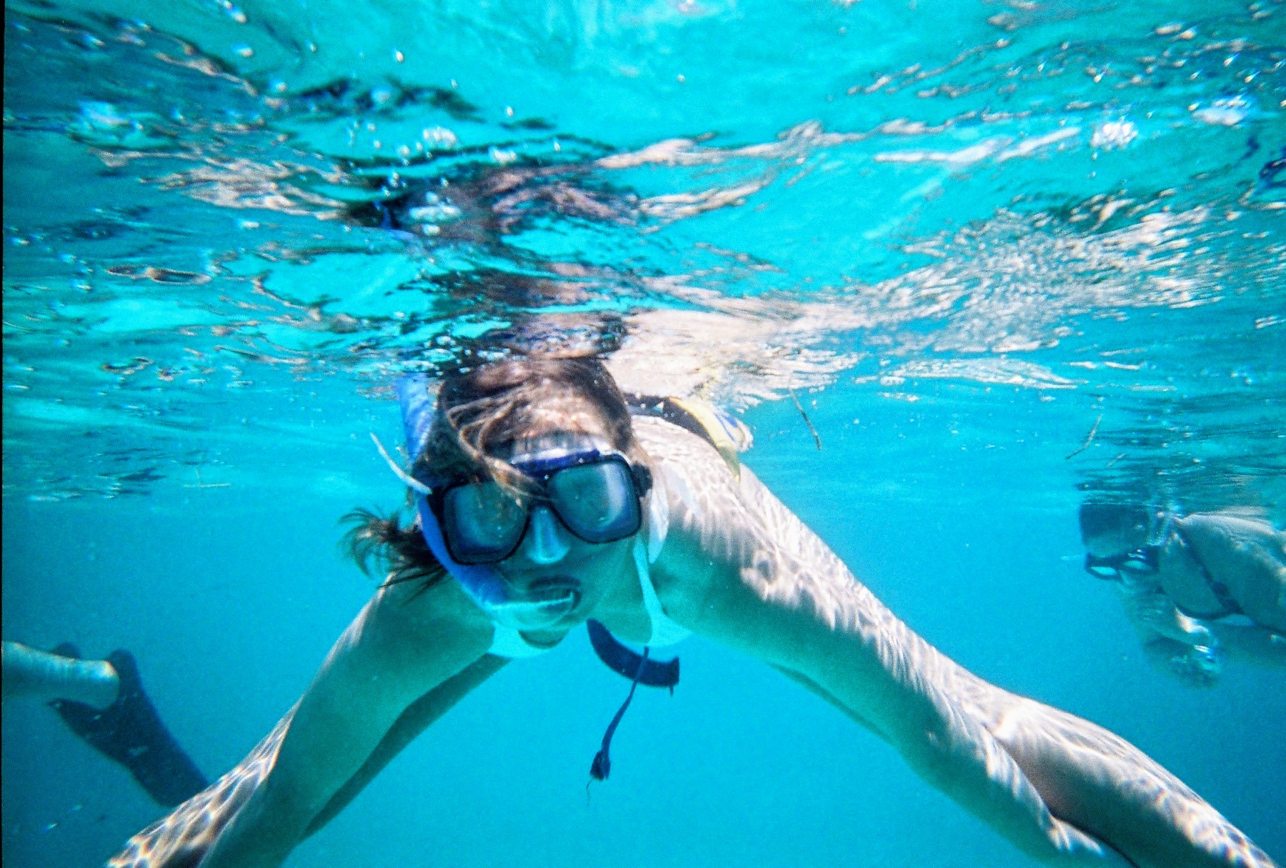 Student snorkeling underwater