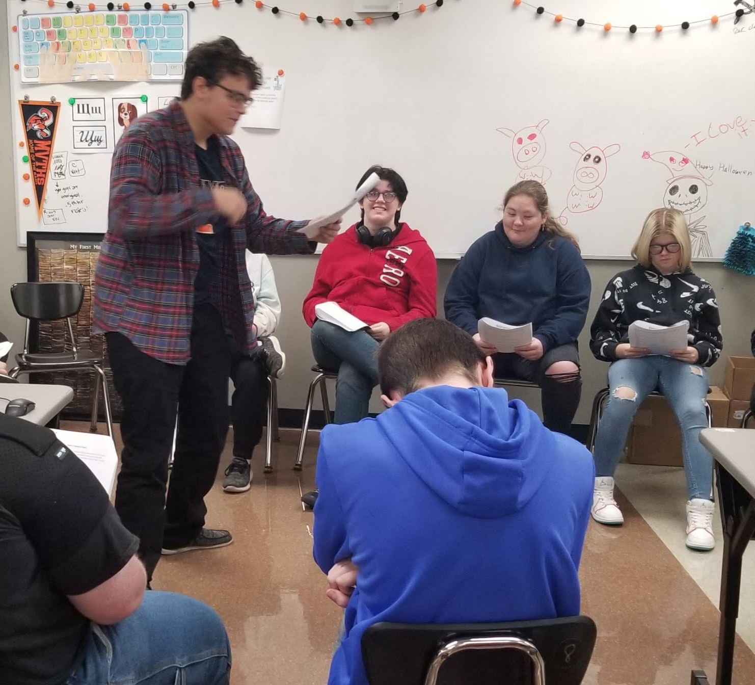 Students performing a Readers' Theater activity based on Russian folklore